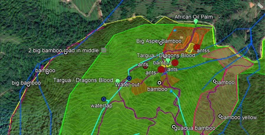 Hand-drawn permaculture design overlay on a satellite image of a property